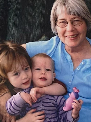 Grandma Pat with my sister and me.