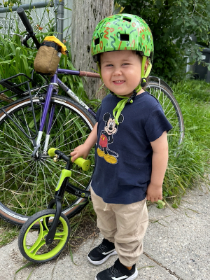 Javi's maintained his love for bikes even through chemotherapy. Here he is in July 2024 going on a ride with his dad.